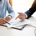 Wealth Management Concept, Business Man And Team Analyzing Finan